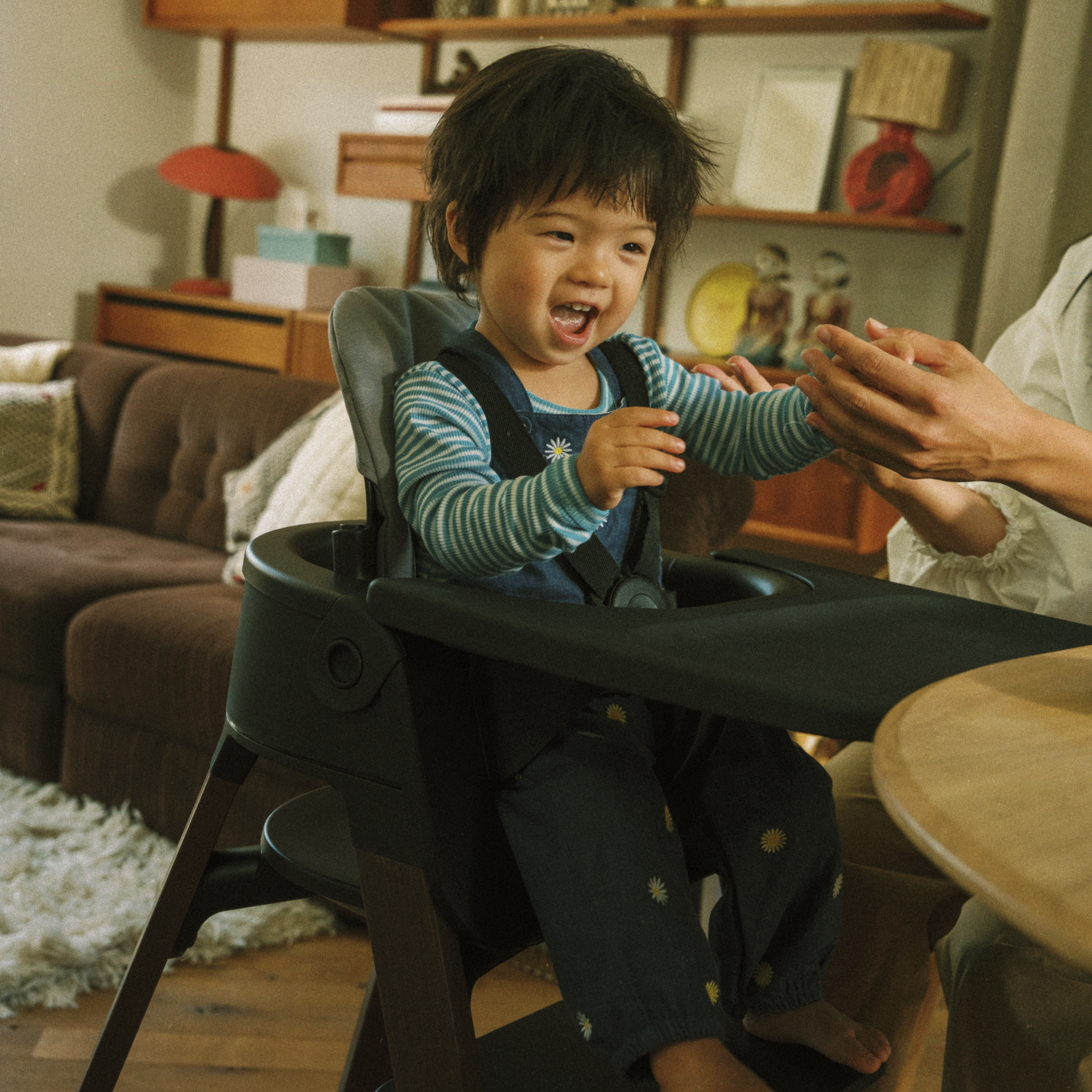 Steps™ | The convertible high chair that adapts with your child
